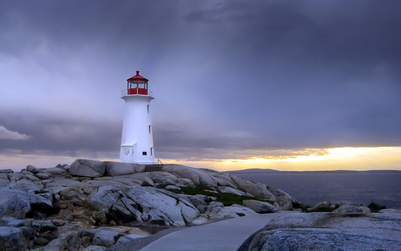 Lighthouse on Rocky Shore — Gray, Dramatic, Sunset