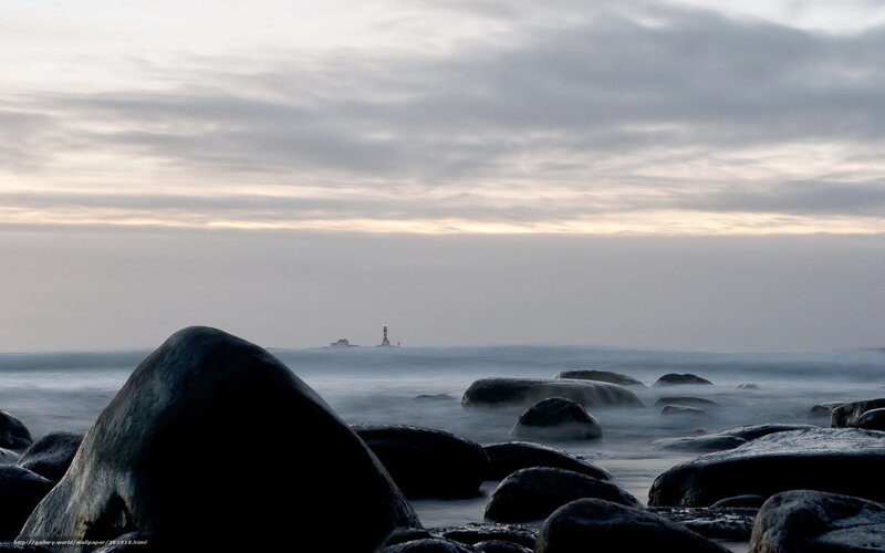 Lighthouse on Rocky Shore — Gray, Serene, Sunset
