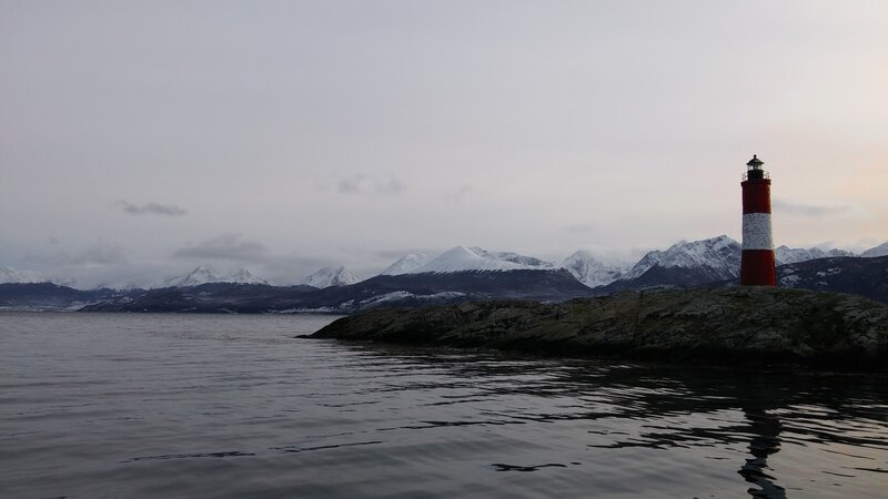 Lighthouse on Rocky Shore — Gray, Serene, Winter