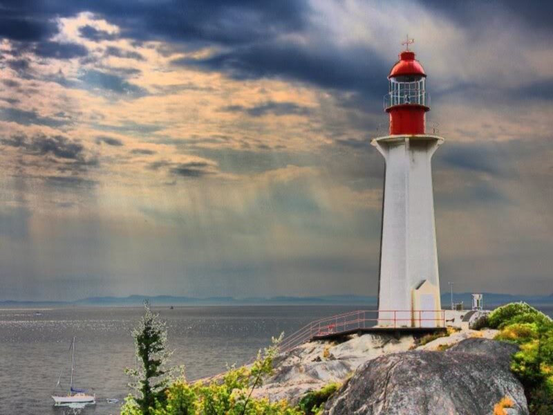 Lighthouse on Rocky Shore — Gray