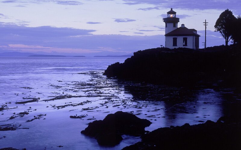Lighthouse on Rocky Shore — Purple, Serene, Sunset, Photograph, Ocean