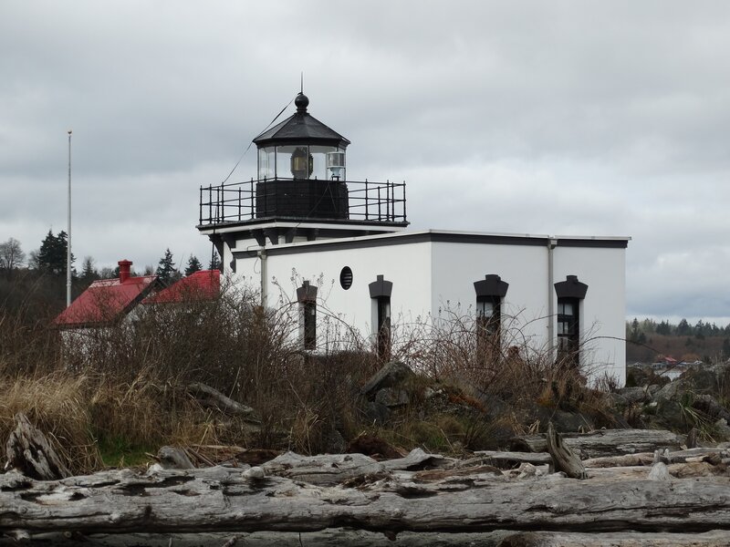Lighthouse on Rocky Shore — White, Overcast