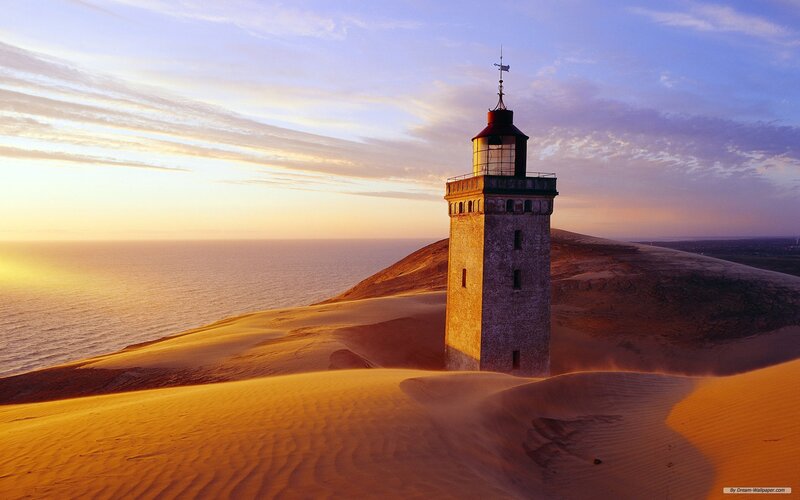 Lighthouse on Sand Dunes — Orange, Serene