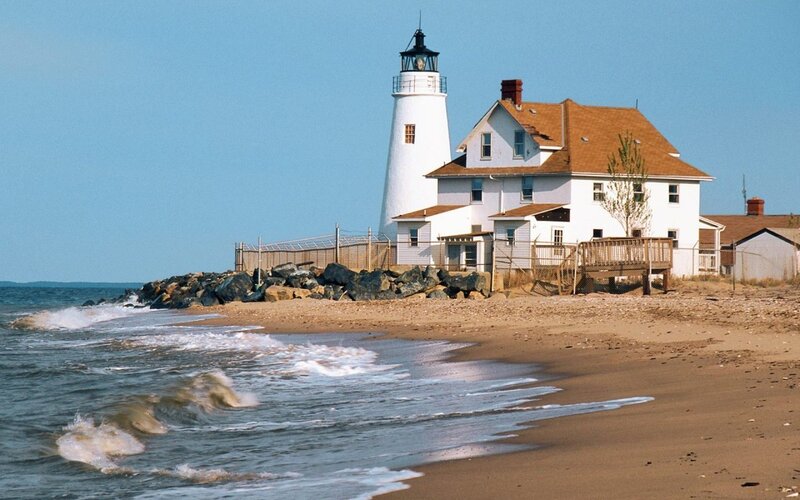 lighthouse on sandy beach