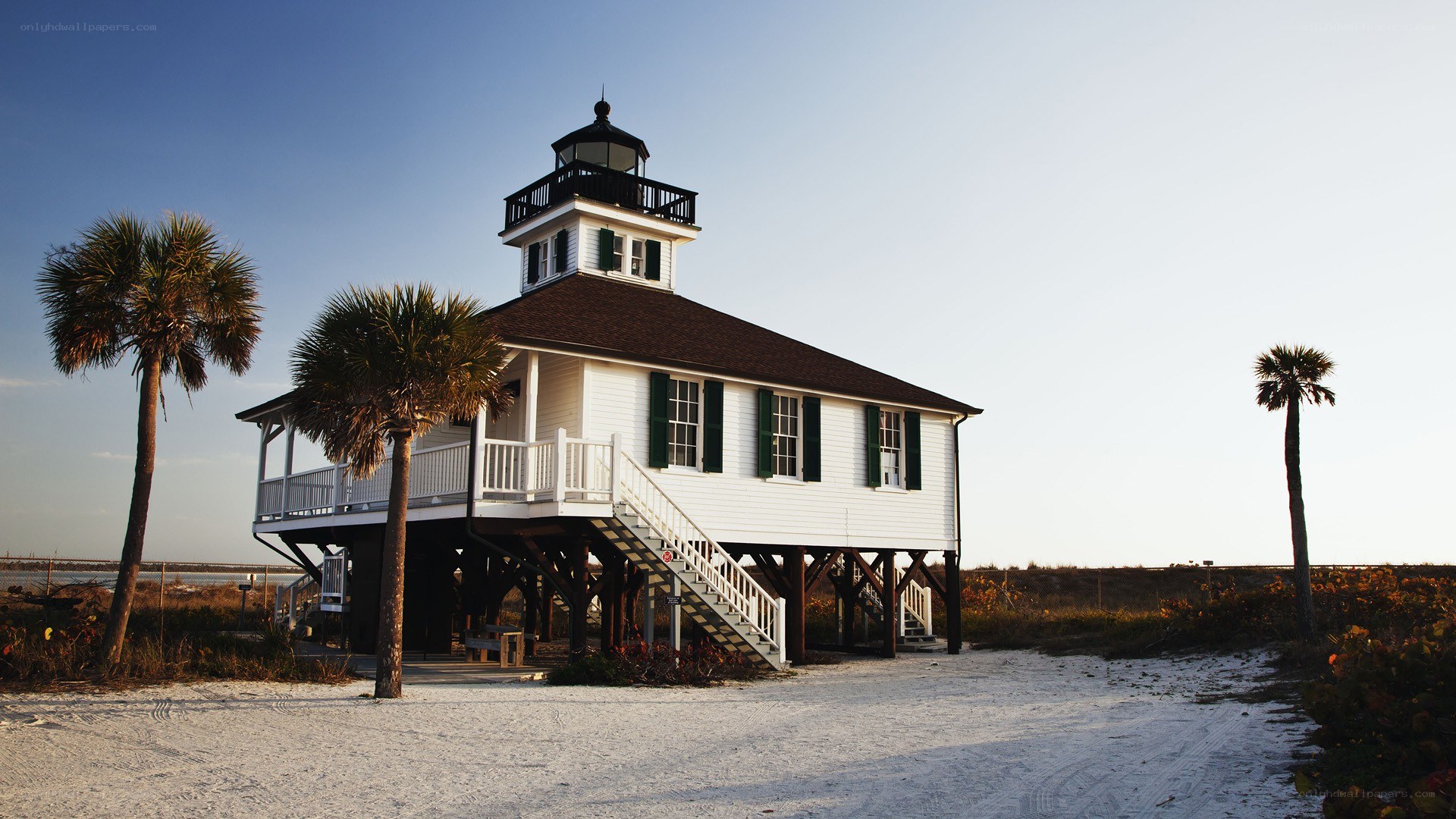lighthouse on sandy beach