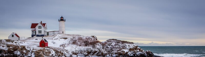 Lighthouse on Snowy Cliff — White, Serene