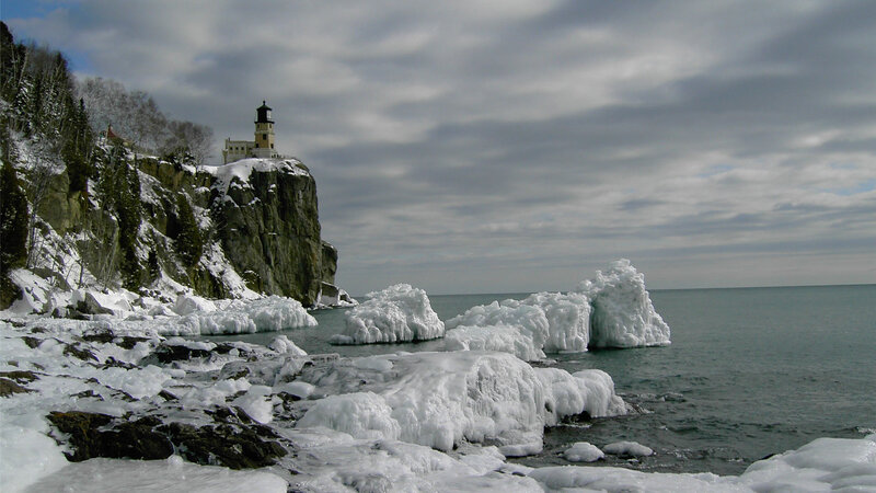 Lighthouse on Snowy Cliff — White