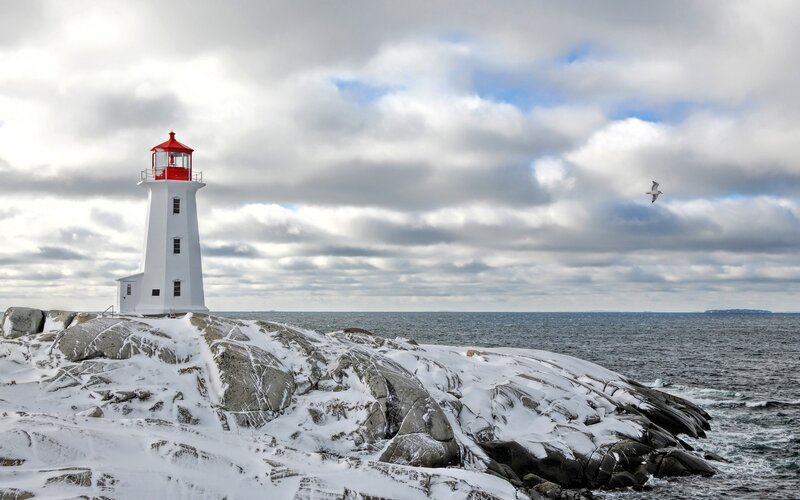 Lighthouse on Snowy Rocks — White