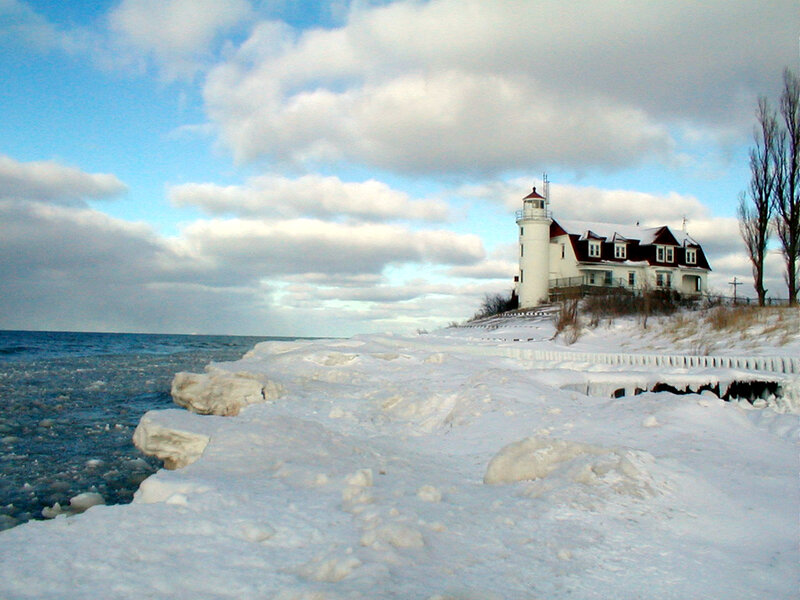 Lighthouse on Snowy Shore — White