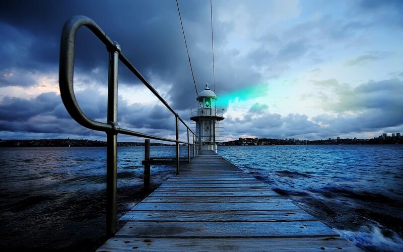 Lighthouse on Wooden Pier — Blue, Dramatic, Sunset, Photograph