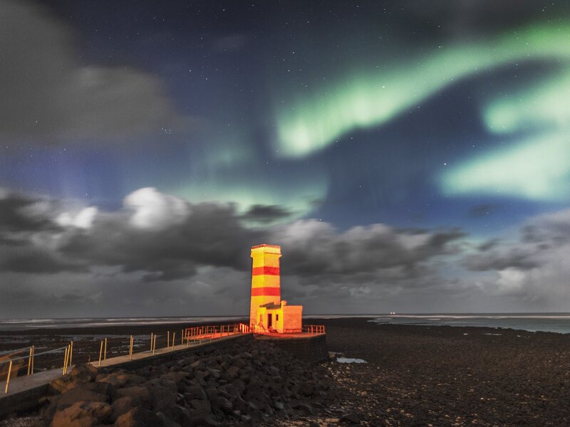 Lighthouse under Aurora — Green, Dramatic