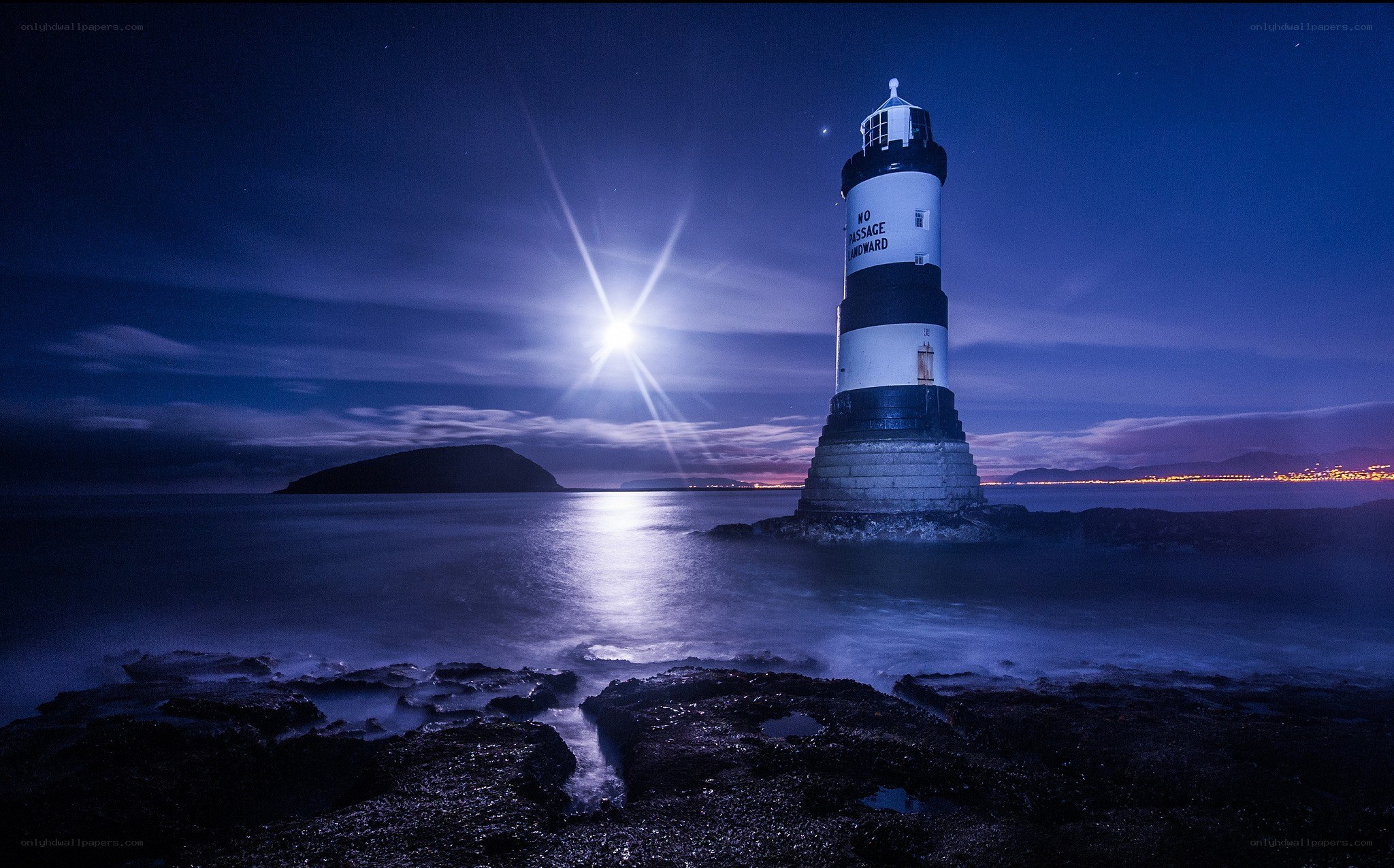 Lighthouse under moonlight