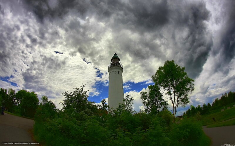 Lighthouse under stormy sky