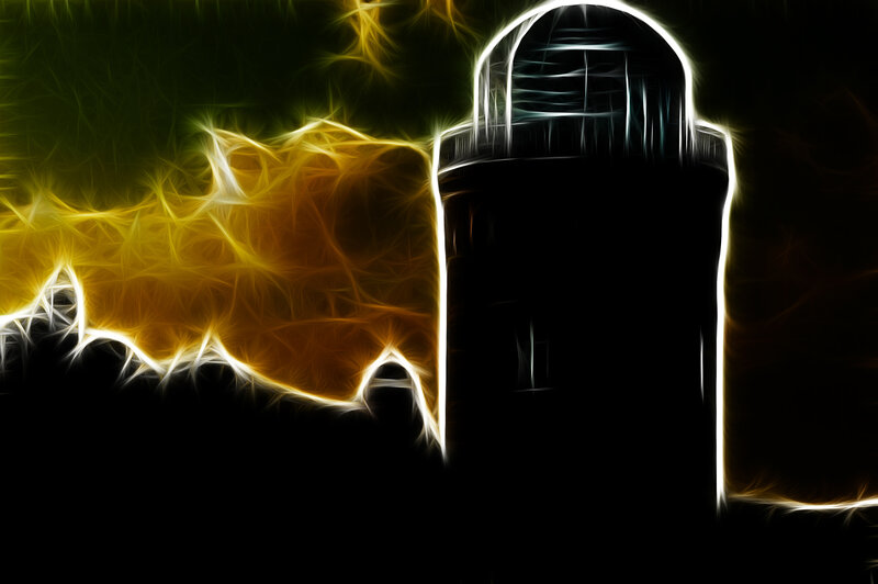 lighthouse with fiery glow