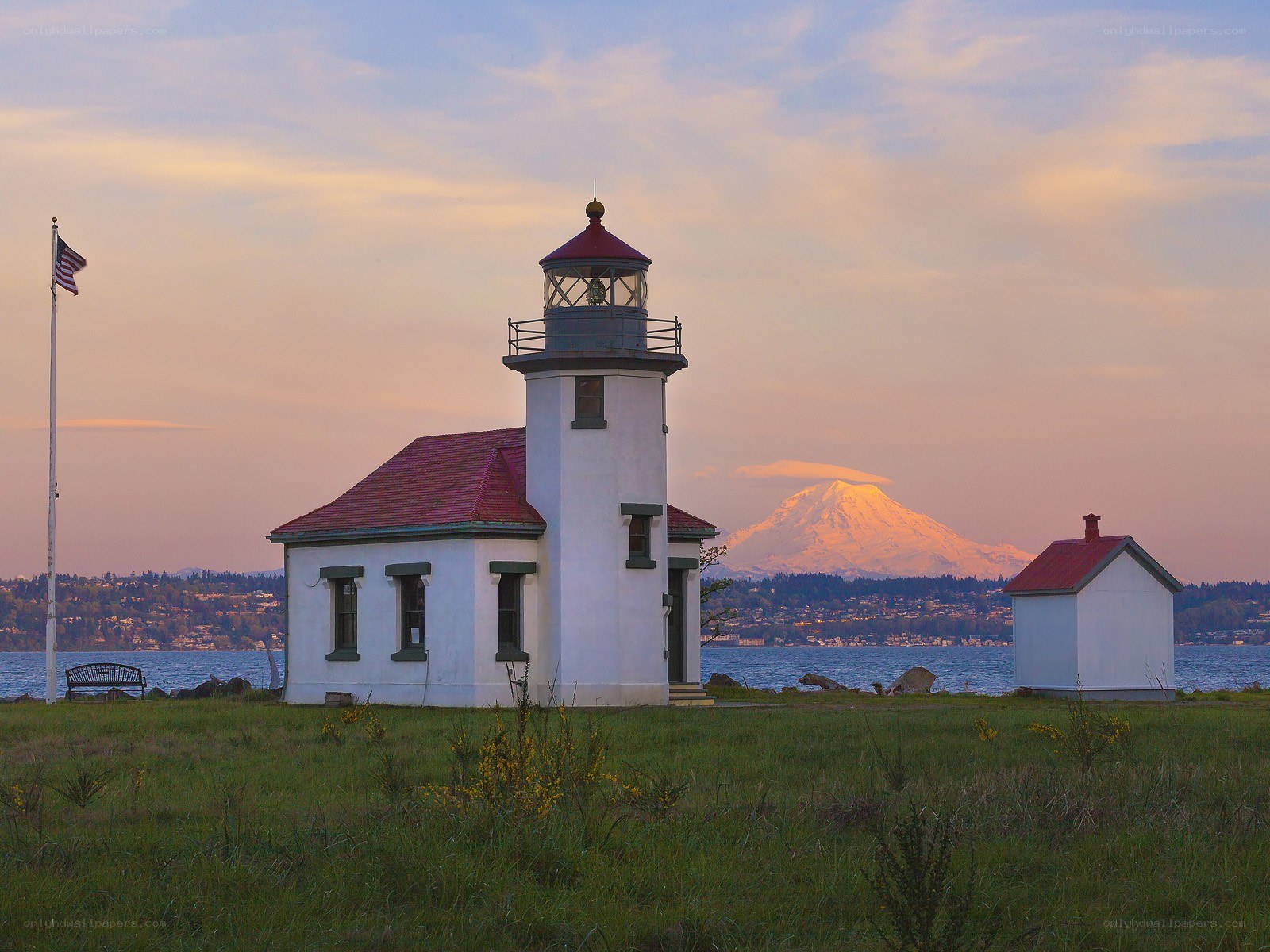 lighthouse with mount rainier