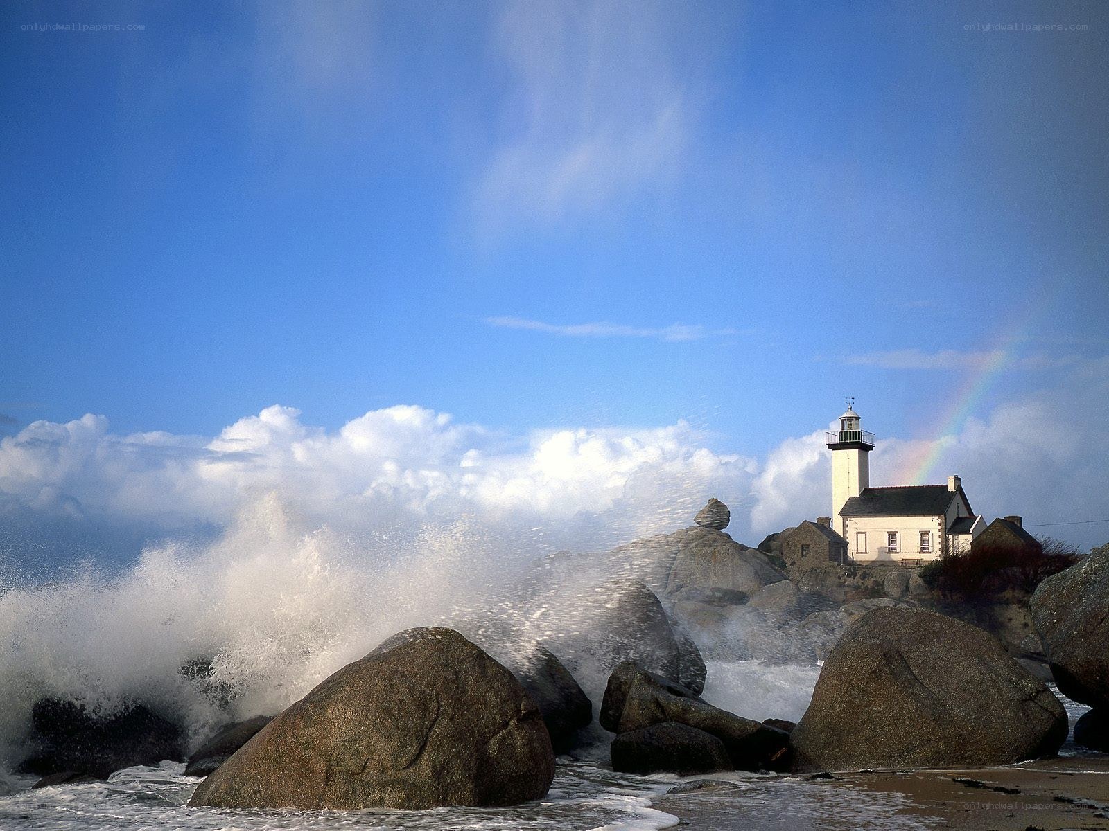 Lighthouse with waves crashing