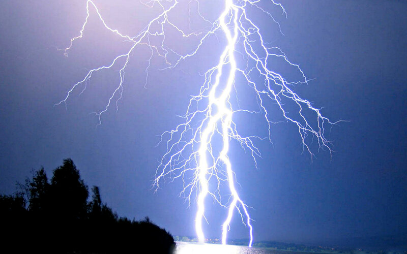 Lightning Bolt Striking Water — Blue, Dramatic