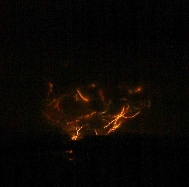 Lightning in Storm Clouds — Black, Dramatic, Night, Photograph, Orange