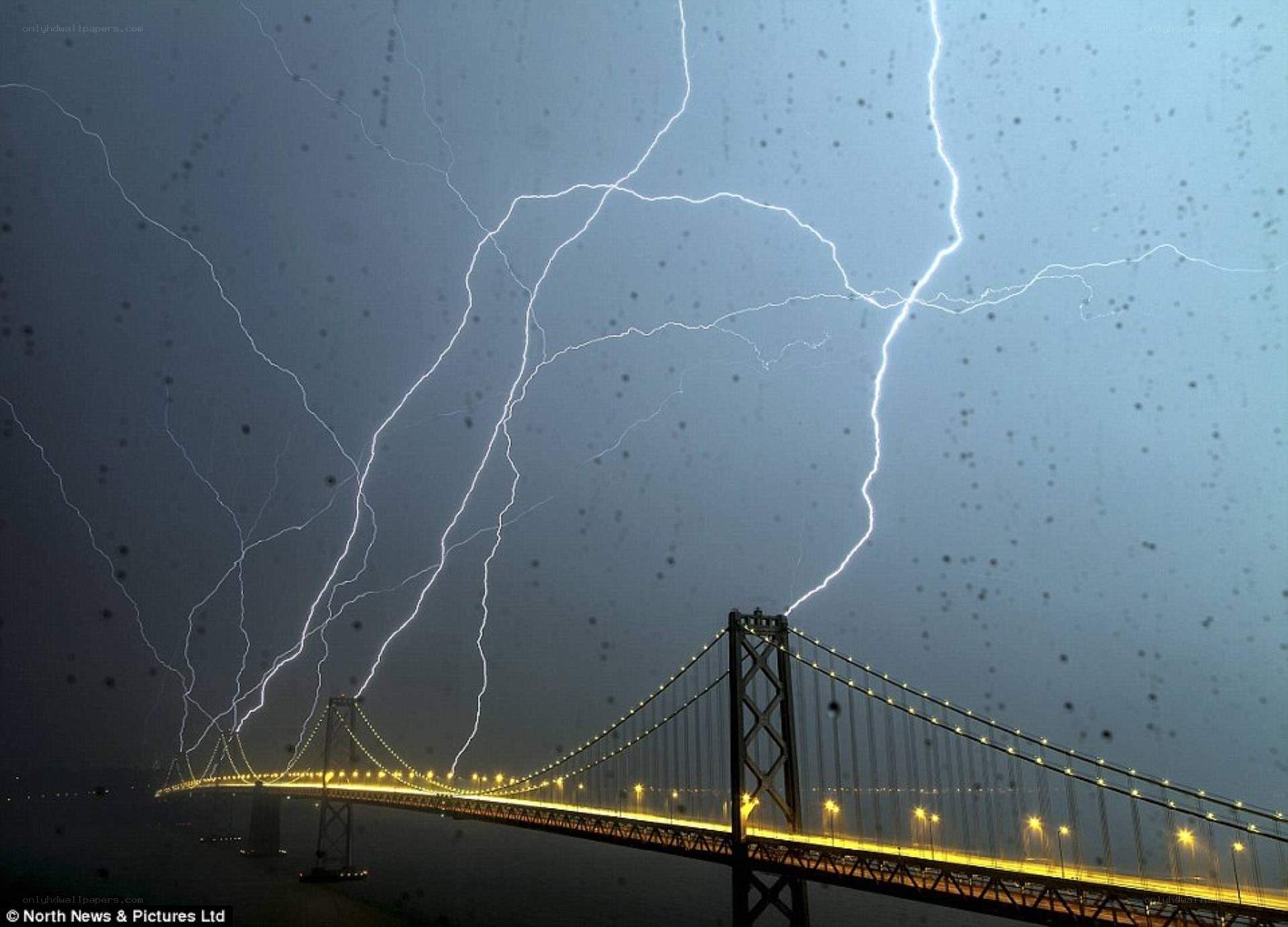 Lightning over a bridge