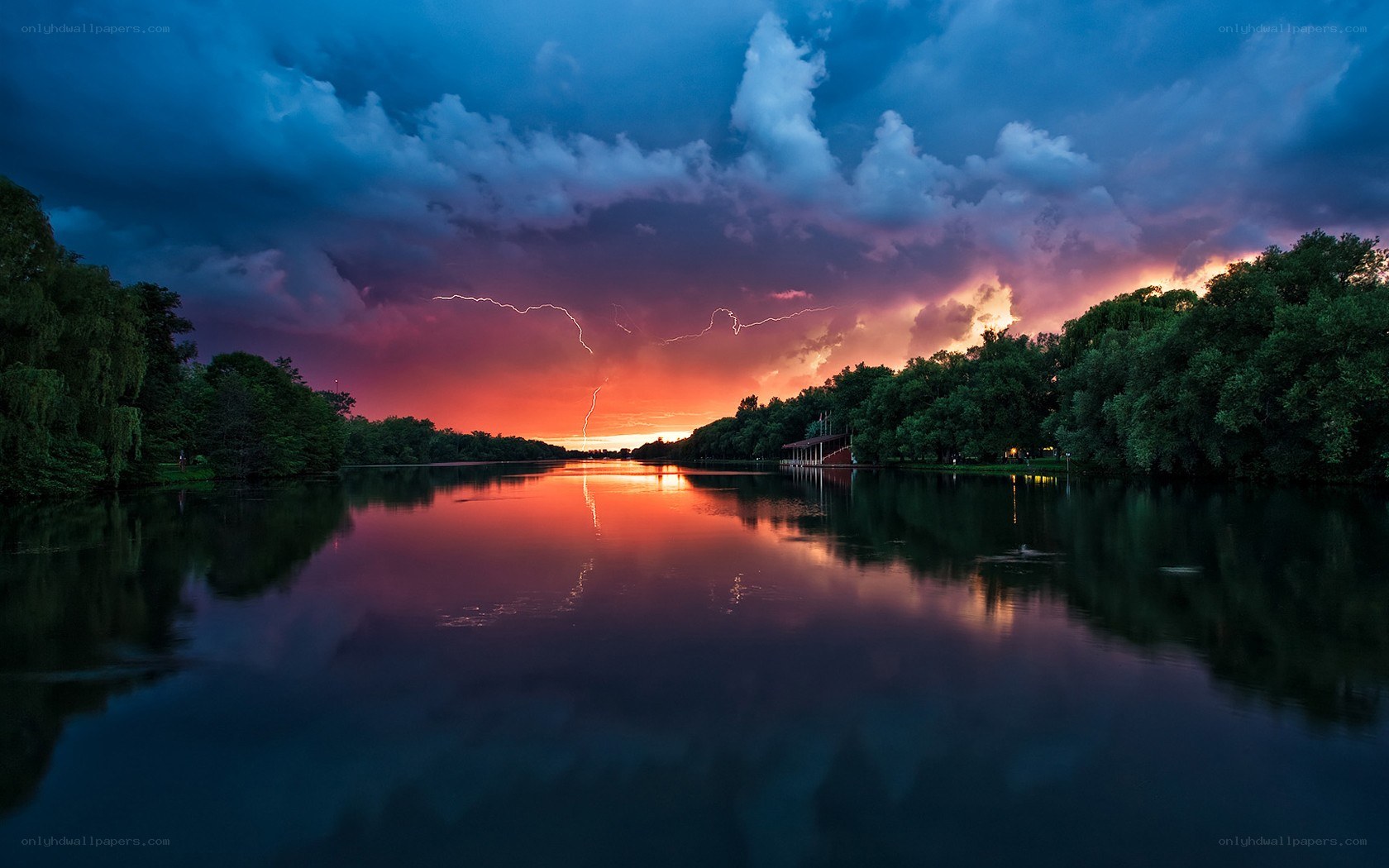 Lightning over a calm lake
