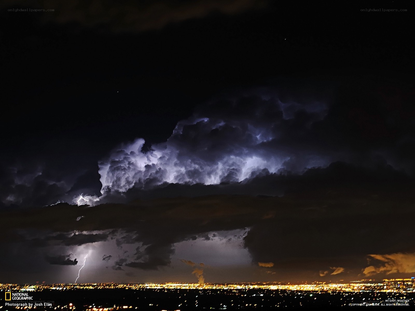 Lightning over a city at night