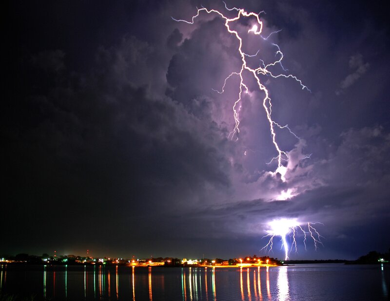 Lightning over a city at night