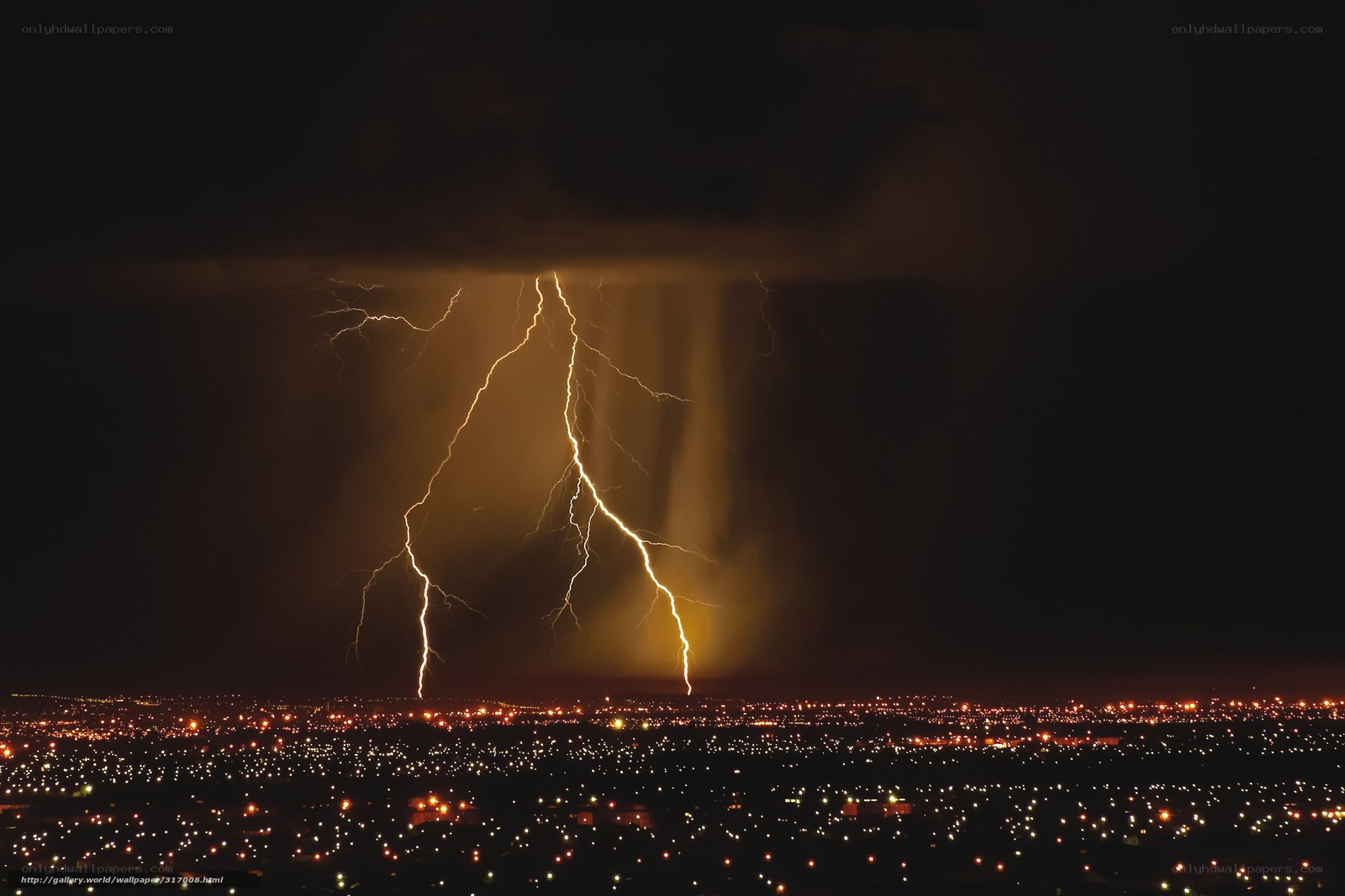 Lightning over a city at night