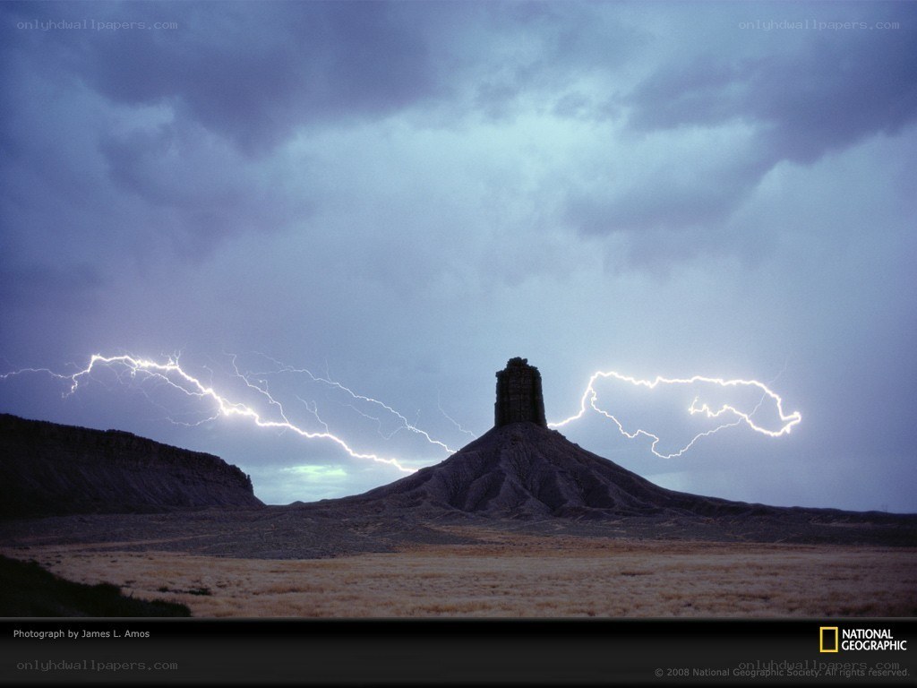 Lightning over a desert butte