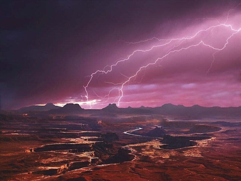 Lightning over a desert canyon