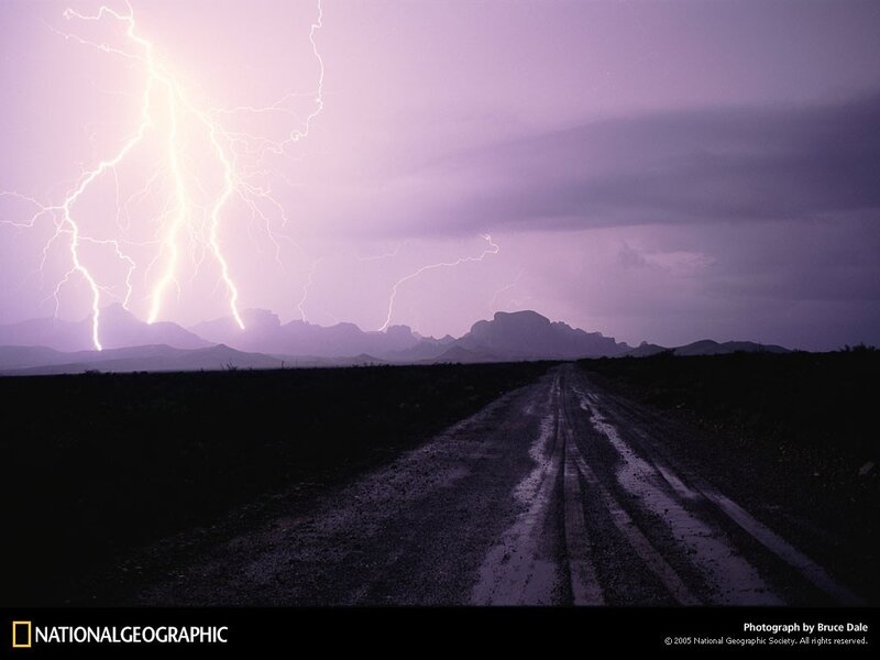 Lightning over a desert road