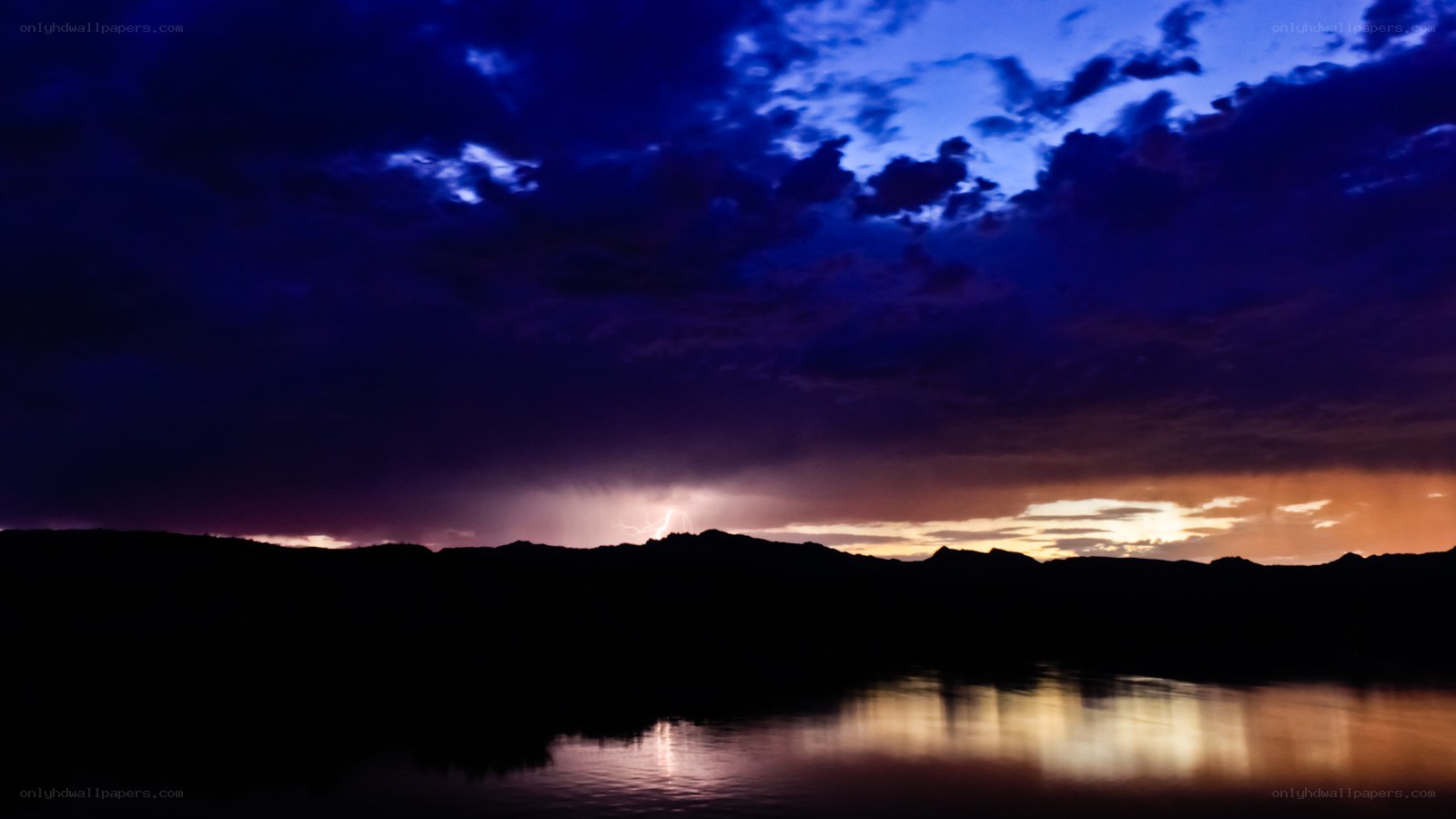 Lightning over a lake at dusk