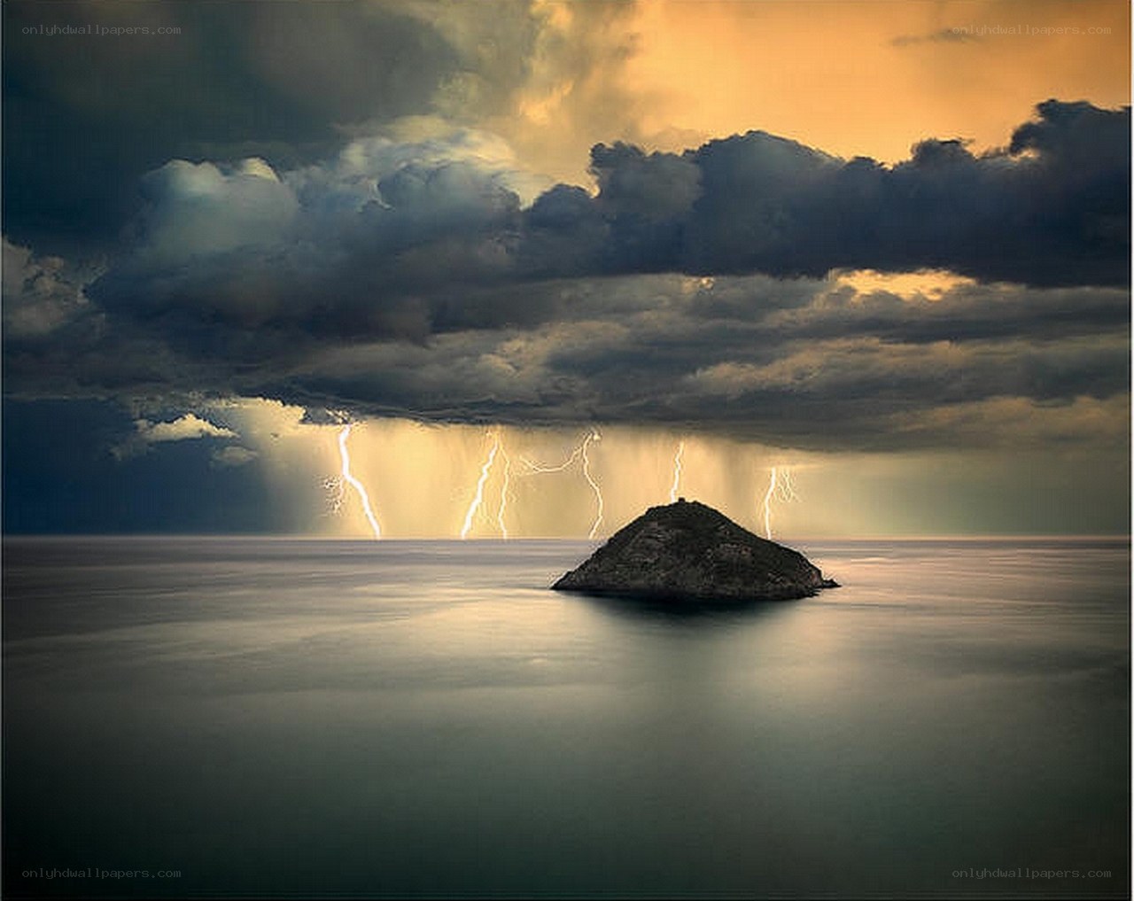 Lightning over a rocky island