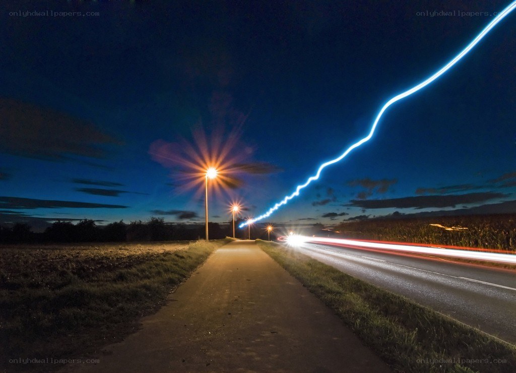 Lightning over a rural road