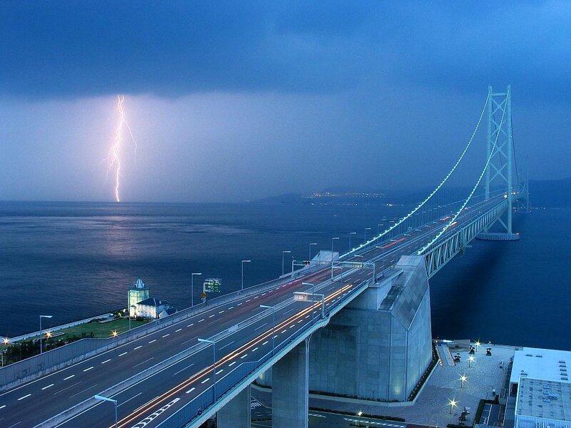 Lightning over a suspension bridge