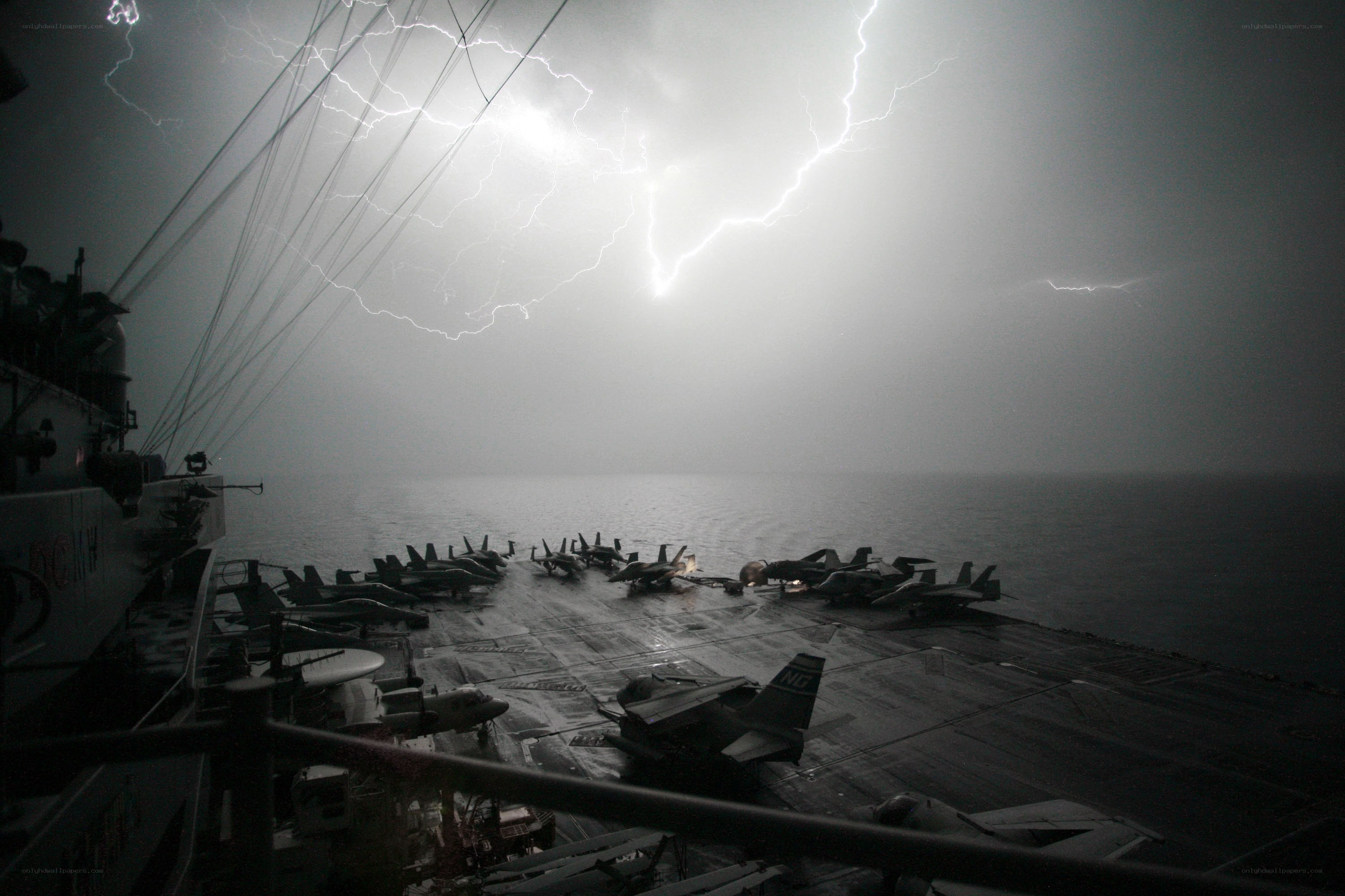 Lightning over aircraft carrier