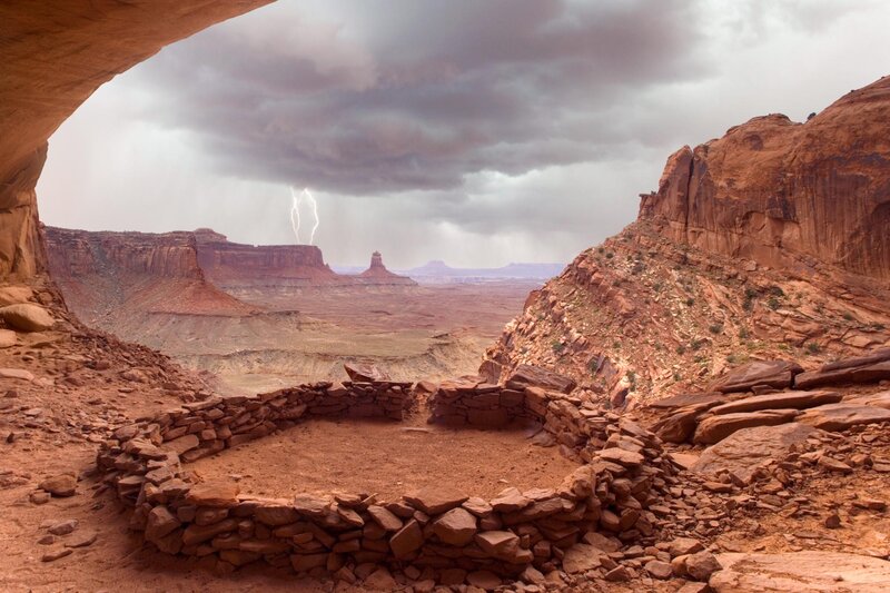 Lightning over ancient ruins