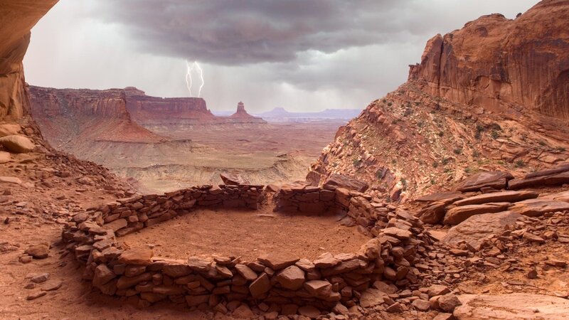 Lightning over ancient ruins