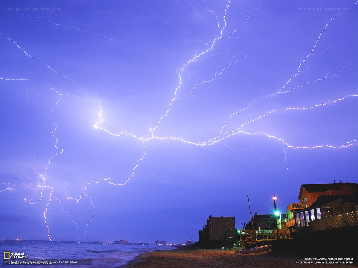 Lightning over beach houses