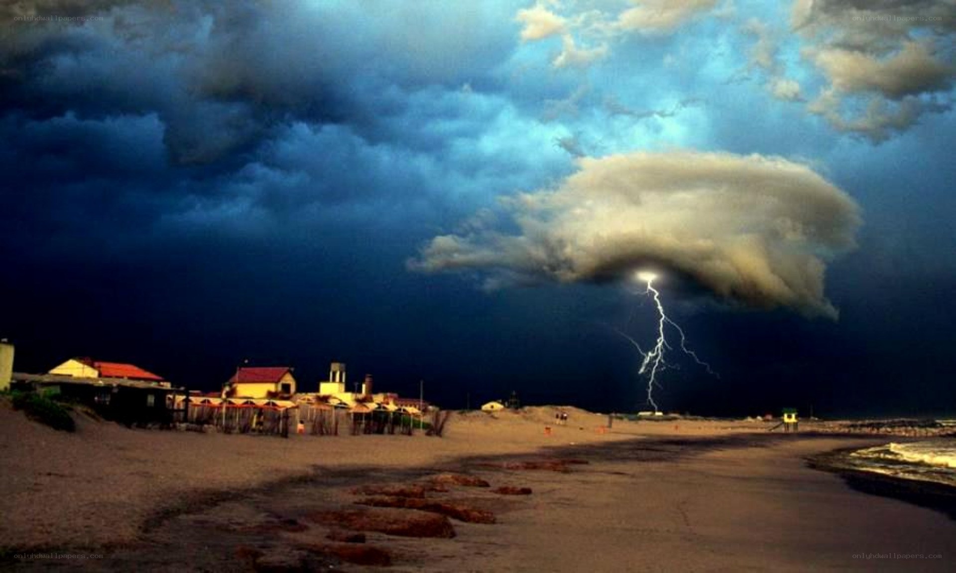 Lightning over beach town