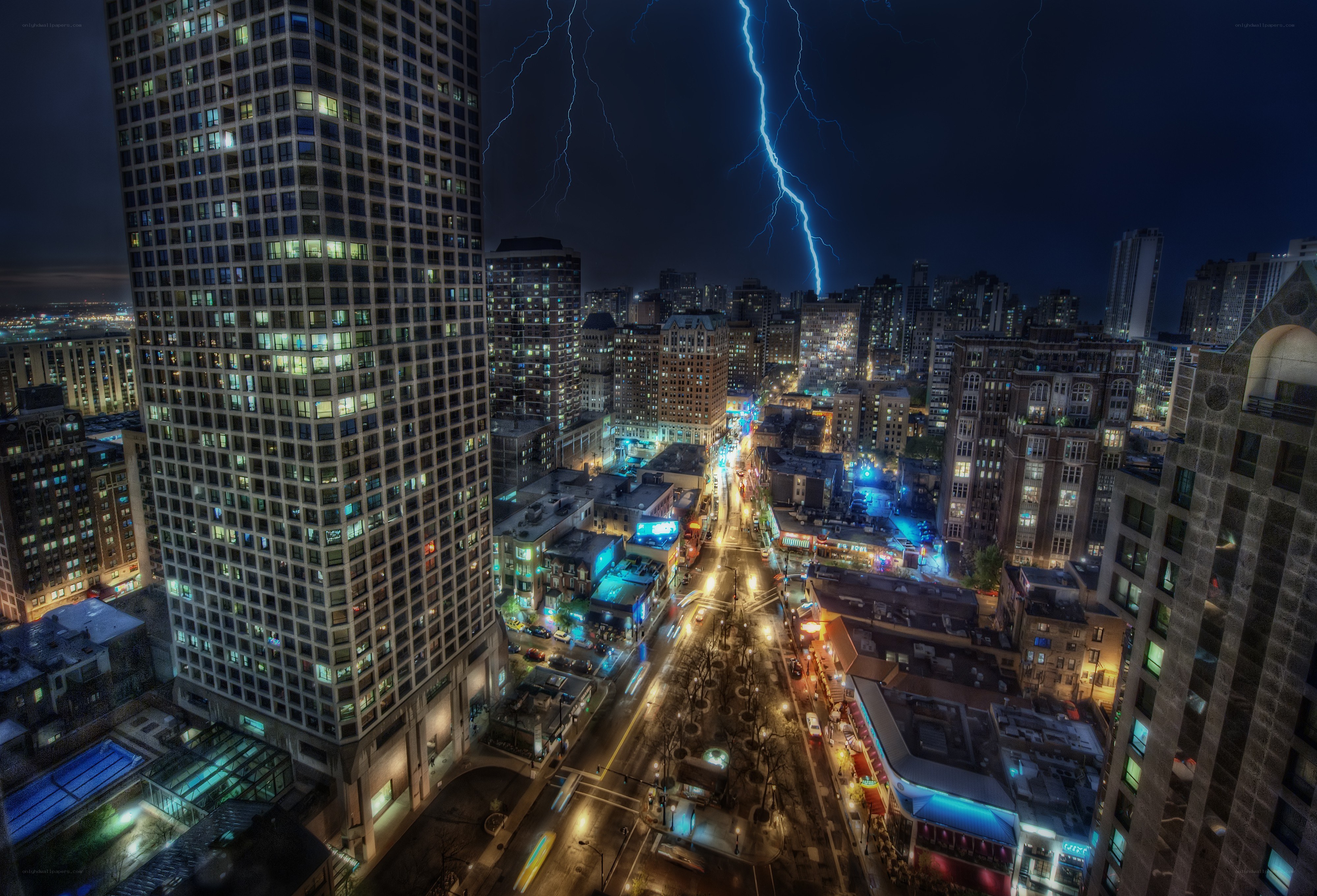 Lightning over city at night