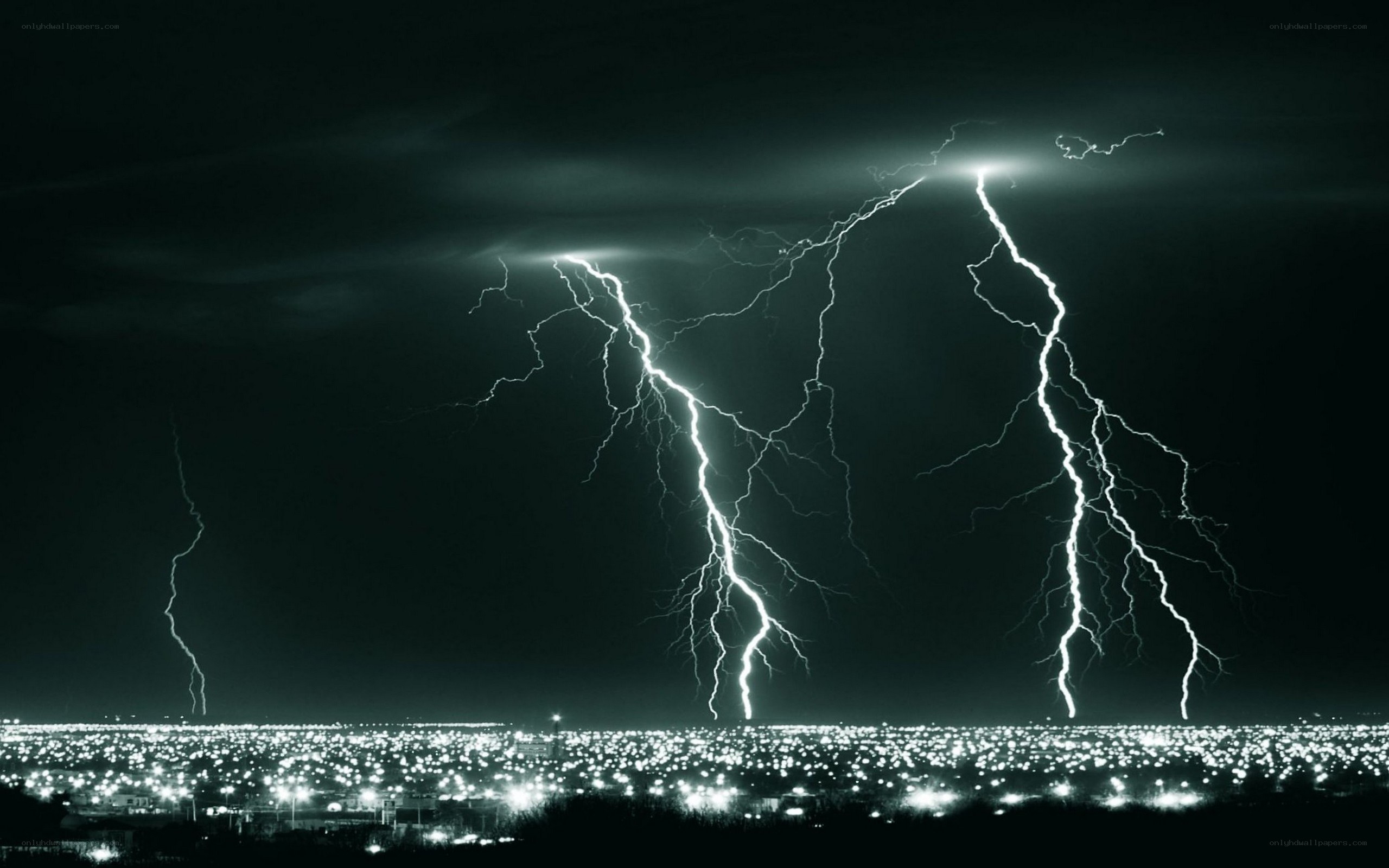 Lightning over city at night