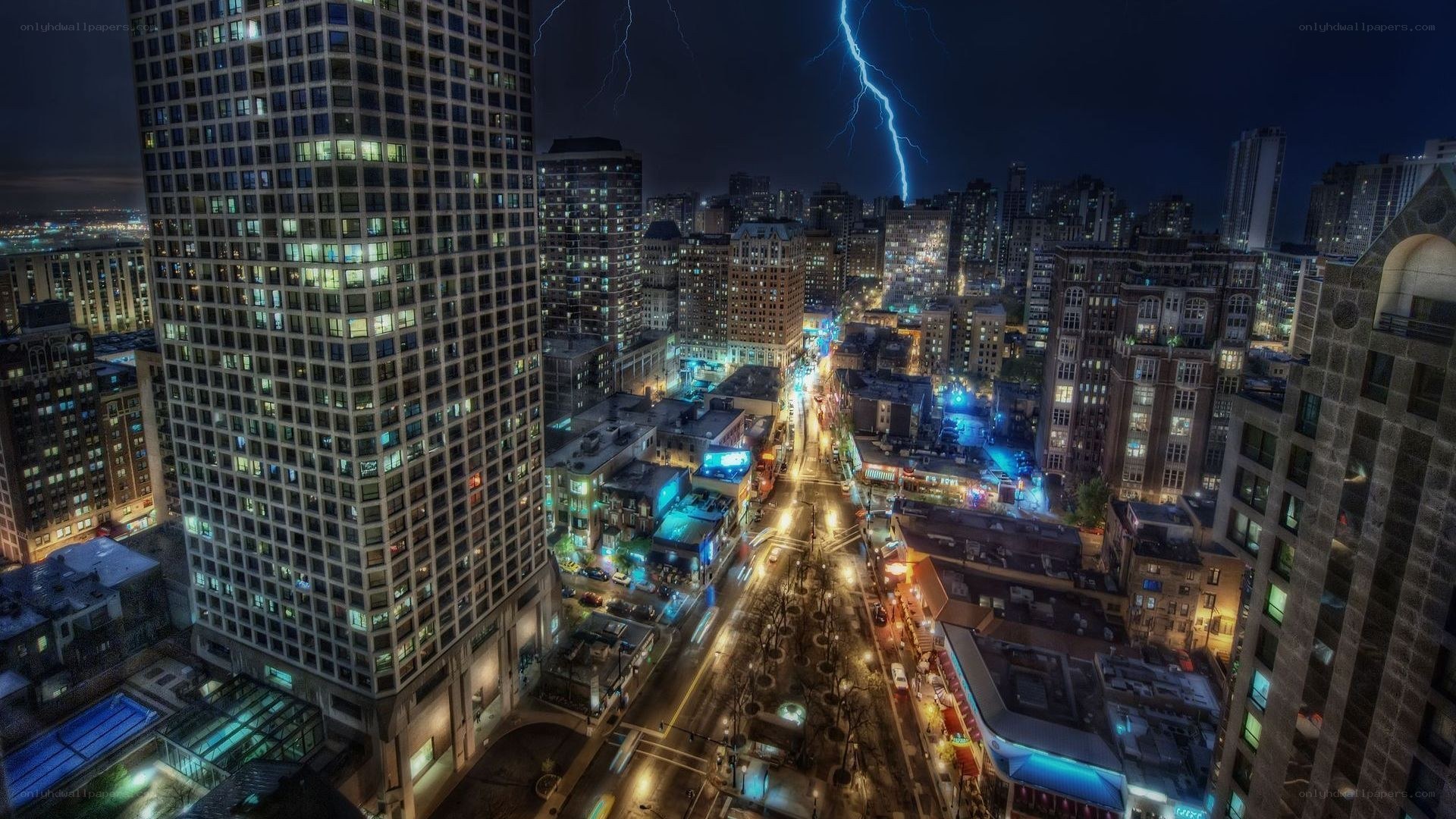 Lightning over city at night