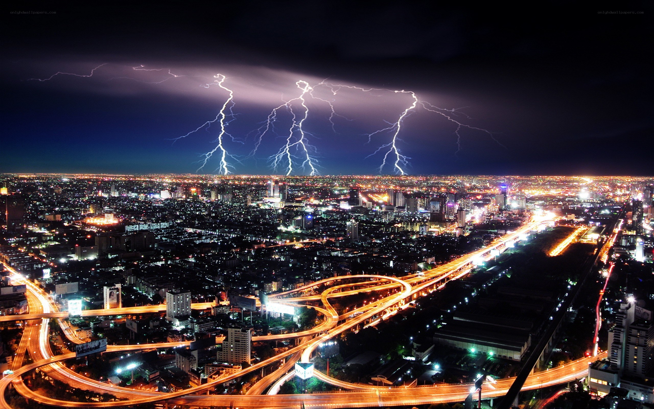 Lightning over city at night