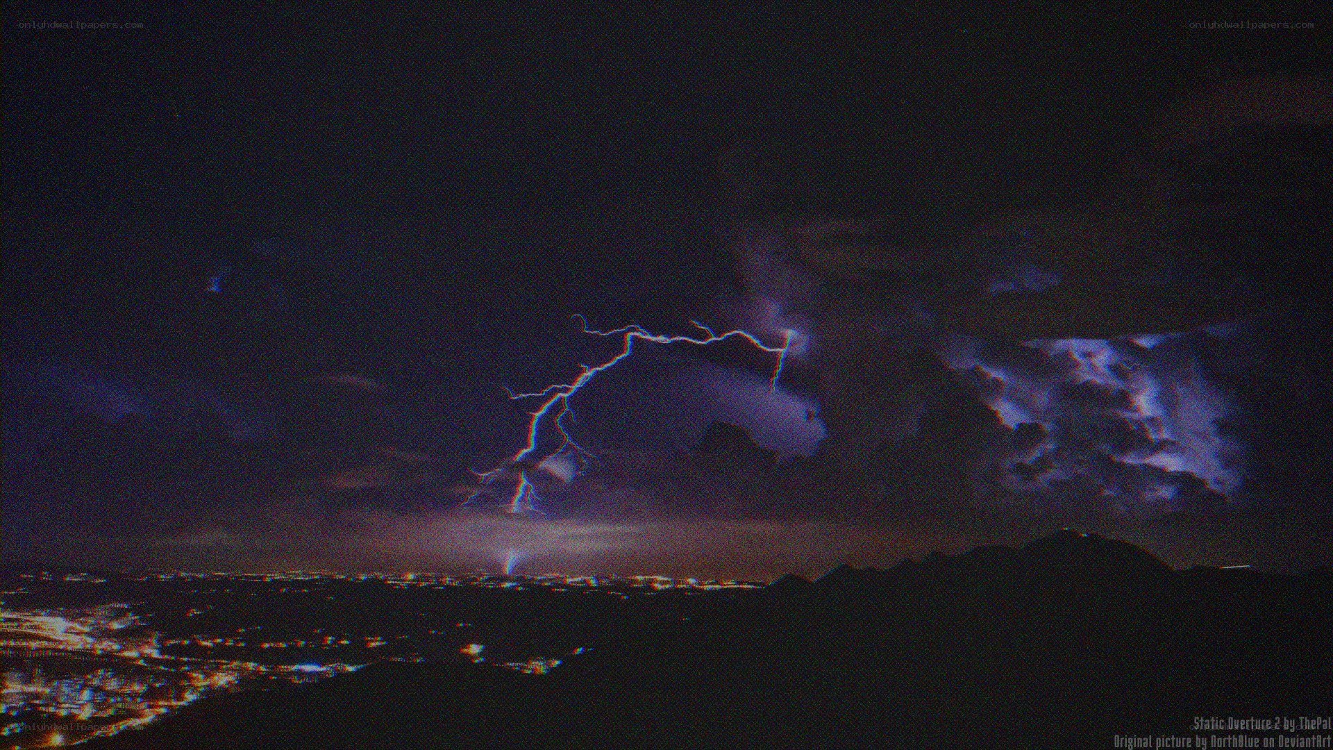 Lightning over city at night