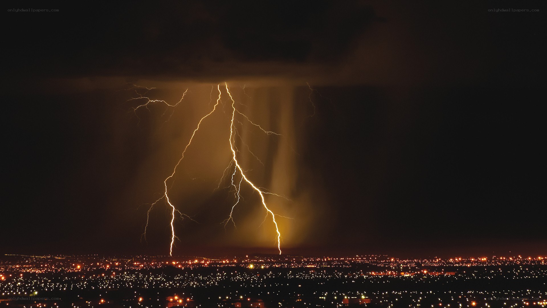 Lightning over city at night