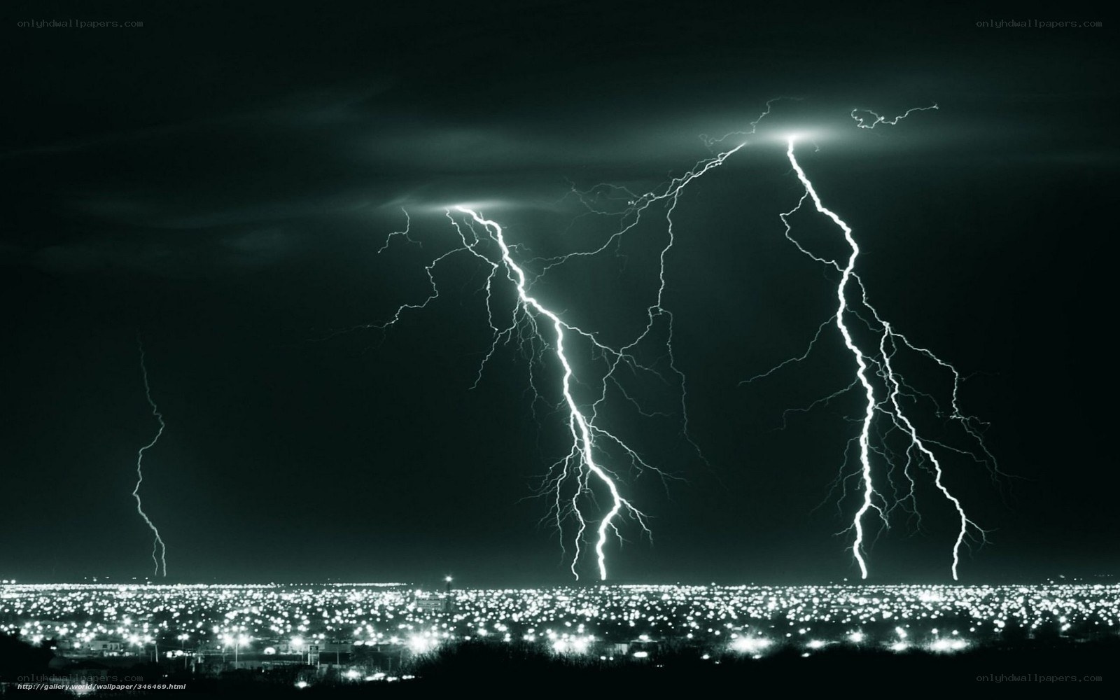Lightning over city at night