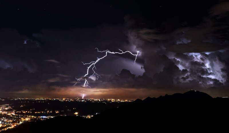 Lightning over City — Black, Dramatic, Night, Photograph, City Lights, Mountains
