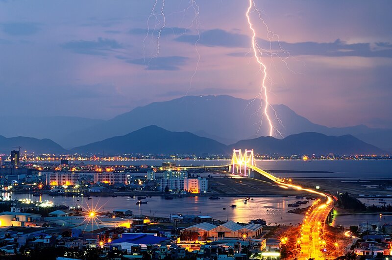 Lightning over City Bridge — Purple, Dramatic, Night, Photograph, Mountains