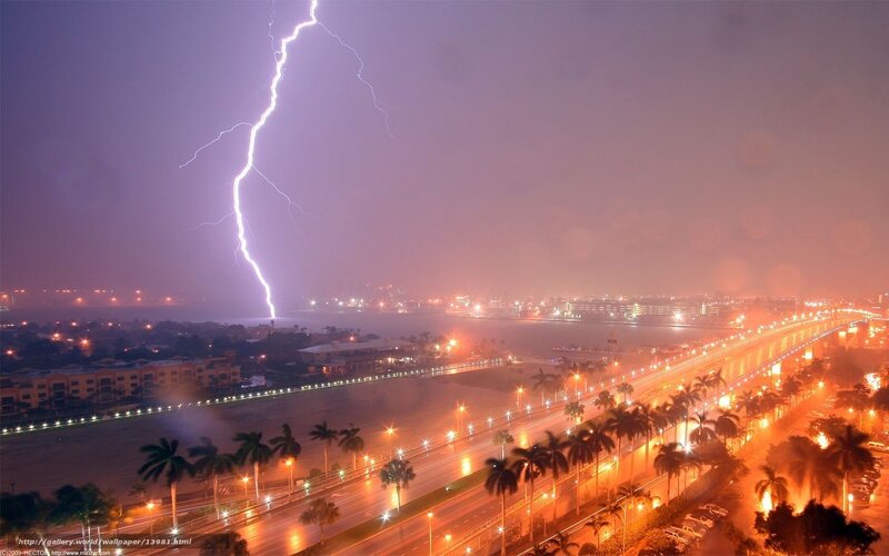 Lightning over city highway
