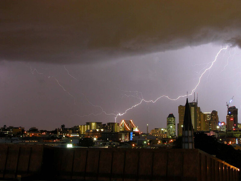 Lightning over City — Purple, Dramatic, Night, Photograph, Buildings, Bridge, Storm Clouds